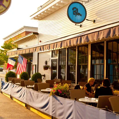 Bleu storefront and patio at Mashpee Commons